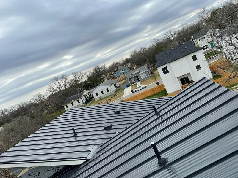 Standing seam metal roof panels with vents for Skylight Repair in Mentor-on-the-Lake